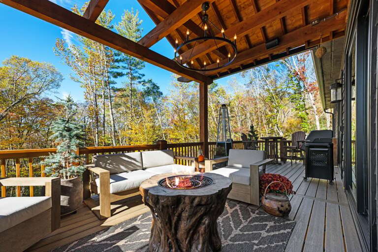 Wooded View From Veranda With Vaulted Ceiling, Versatile Furnishings, Vibrant Foliage