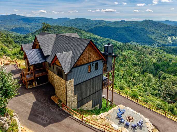 Perched above the Blue Ridge with sweeping mountain views in every direction. The fire pit circle is ready for your crew.
