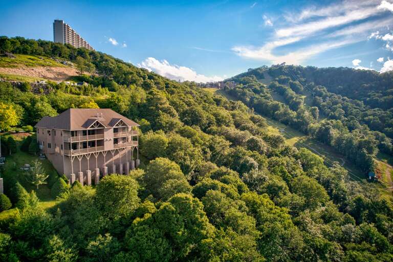 Your home base in the Blue Ridge, perched above the slopes with sweeping mountain valley views stretching for miles.
