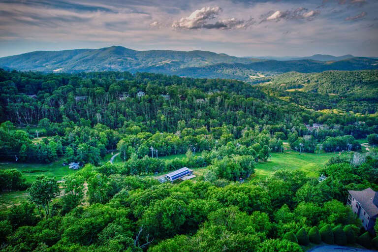 Your home base in the Blue Ridge, perched above the slopes with sweeping mountain valley views stretching for miles.