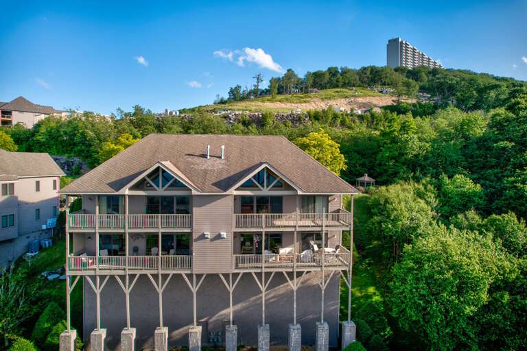 Perched high above the Blue Ridge valley, this mountain retreat offers sweeping views right from the parking area.