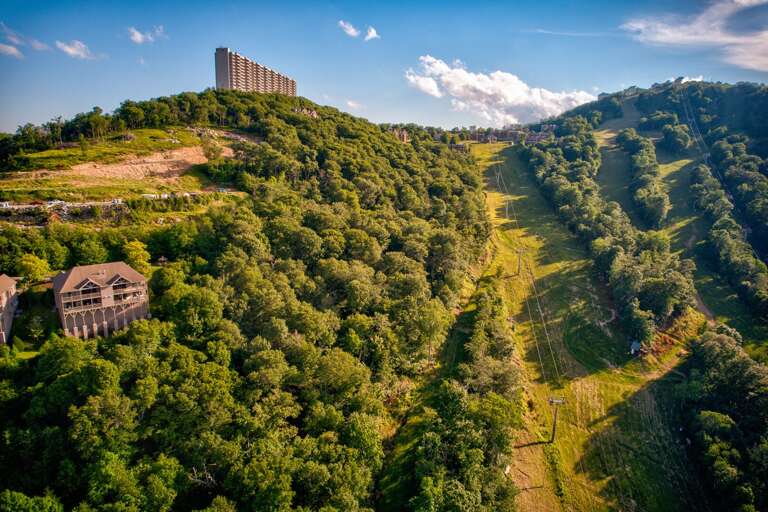 Sweeping Blue Ridge views stretch out beyond the resort, with the valley and peaks of Sugar Mountain right at your doorstep.