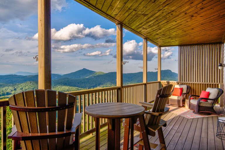 Wide open skies and ridge-to-ridge views from the covered deck. A front-row seat to the Blue Ridge every single day.
