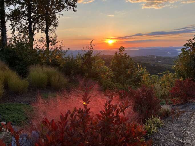Sunset Sinks Behind Hills; Hues Highlight Horizon