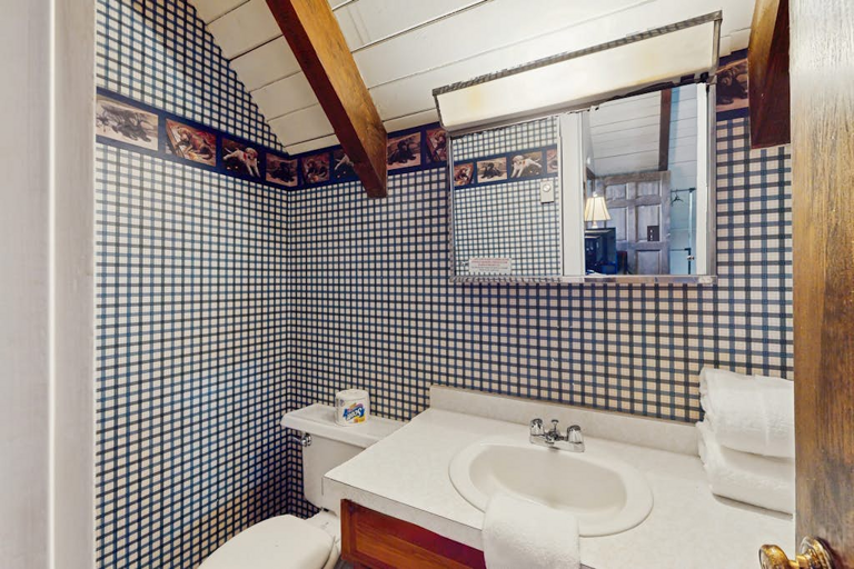 Half bathroom with sink & toilet