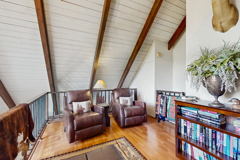 The loft area is the perfect place to kick back with your favorite book, or select from the books available at the chalet!