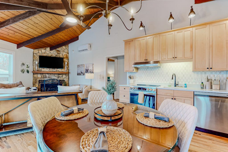 The eat-in kitchen has a round table for four, a perfect place to break bread together.
