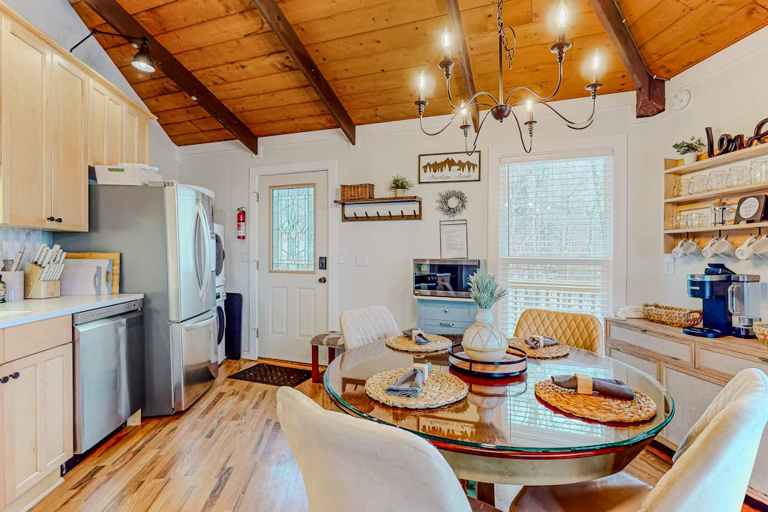 The eat-in kitchen has a round table for four, a perfect place to break bread together.