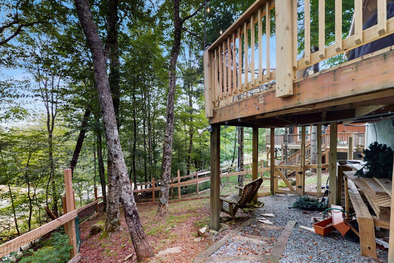 The yard is fenced in around the breadth of the property, with a beautiful creek on the other side of the fence.