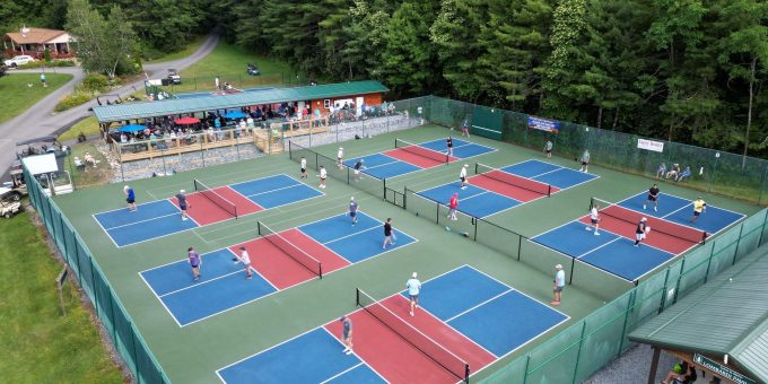 Amenities at Linville Land Harbor include a basketball court, a private beach on a 45-acre lake,