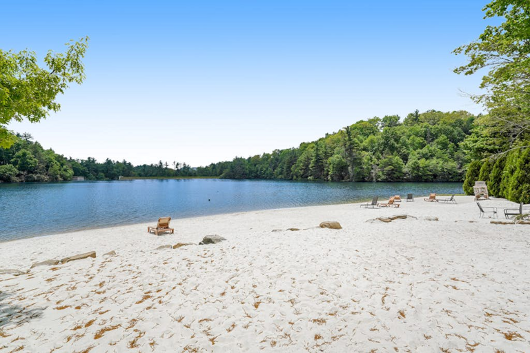 Amenities at Linville Land Harbor include a basketball court, a private beach on a 45-acre lake,