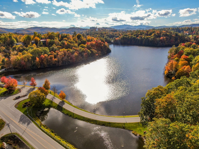 Amenities at Linville Land Harbor include a basketball court, a private beach on a 45-acre lake,