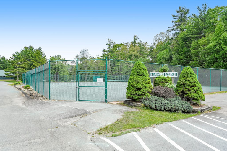 Amenities at Linville Land Harbor include a basketball court, a private beach on a 45-acre lake,