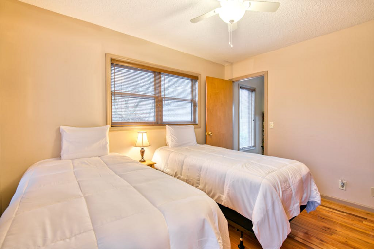 Also on the main level is a bedroom with a pair of twin beds.
