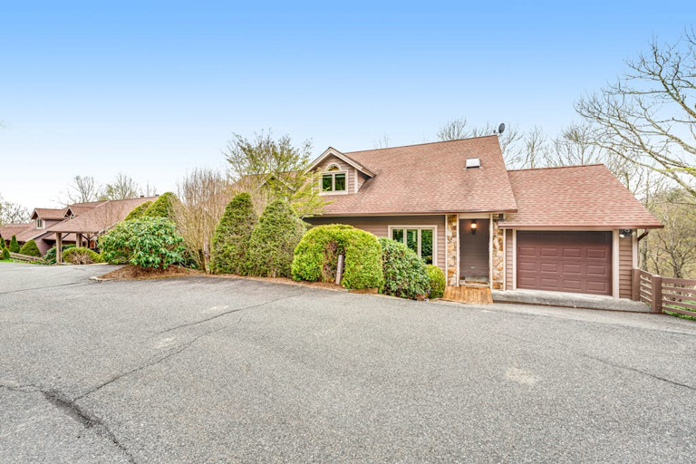 Mountain Magic offers a welcoming arrival tucked into the peaceful Yonahlossee setting with end-of-the-road privacy!