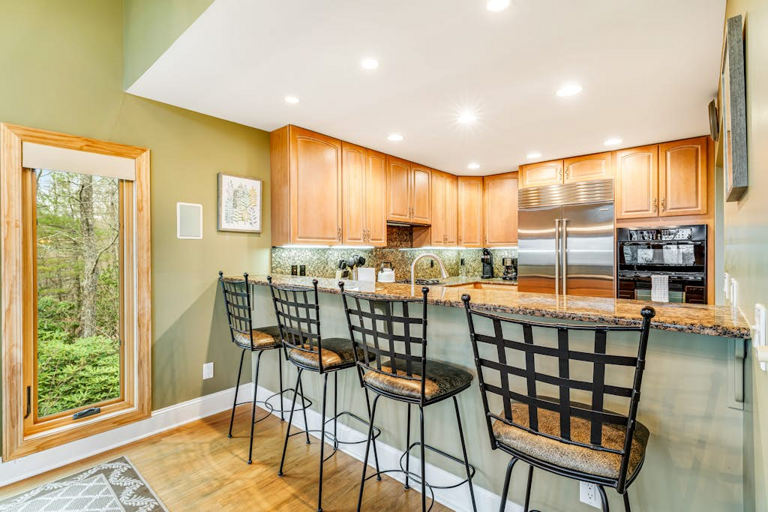 Pull up a seat at the kitchen bar for coffee, breakfast, or casual conversation.