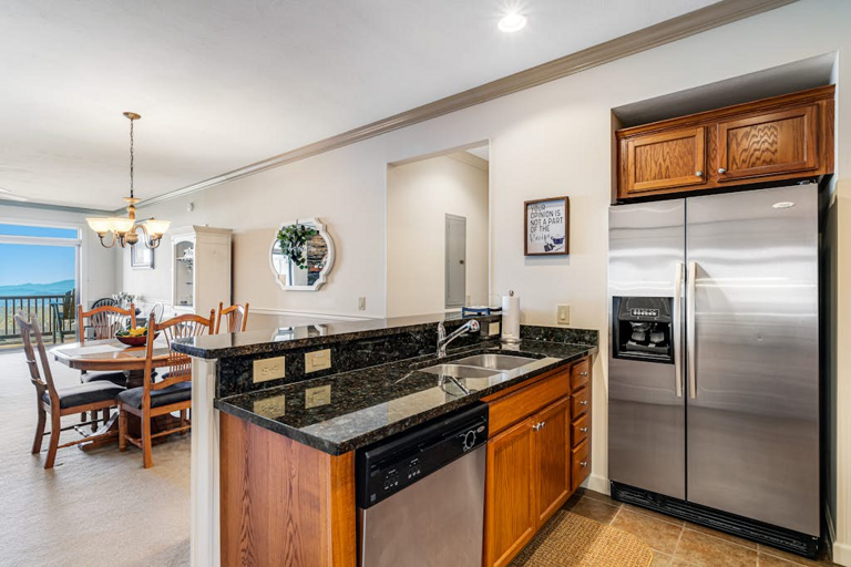 The well-equipped kitchen makes meals at the condo easy, with granite counters and stainless steel appliances.