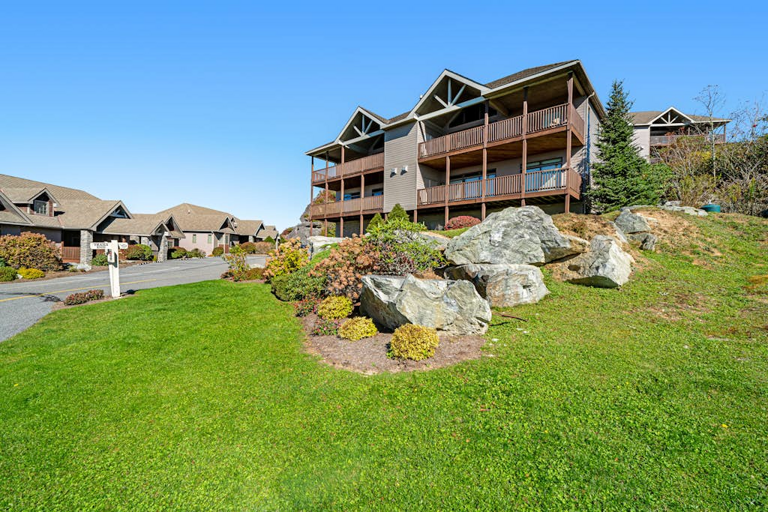 Manicured grounds and mountain architecture create a beautiful setting at The Reserve.