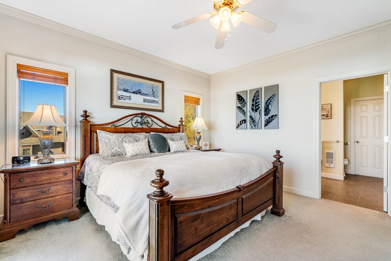 Settle into the inviting primary bedroom for a peaceful night's rest in the mountains.