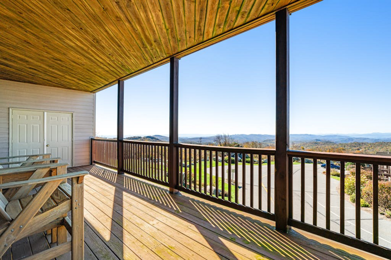 Step onto the covered deck and take in sweeping views of the surrounding Blue Ridge Mountains.