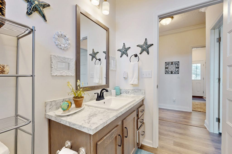 A bright guest bathroom offers a convenient place to refresh before another day of mountain adventures.