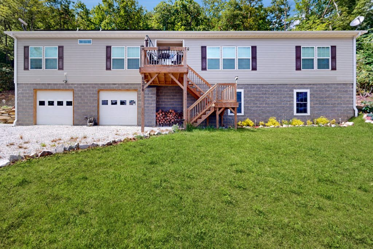 A spacious lawn and elevated deck give you room to enjoy the fresh mountain air right at home.