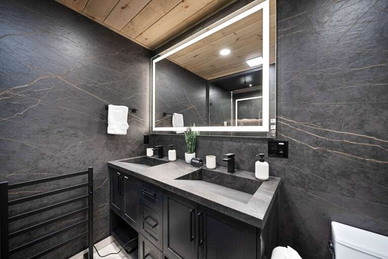 Double vanity ramp sinks and towel warming rack