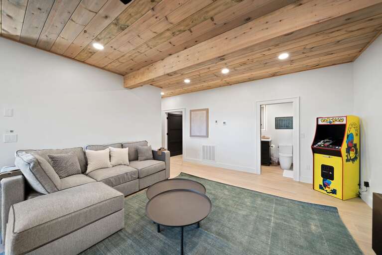 Lower Level 1 Family Room with whimsical arcade game