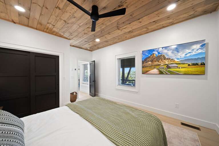 Lower Level 1 Queen Bedroom with flat headboard