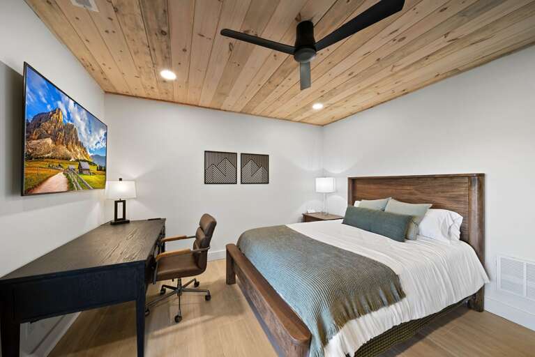 Lower Level 2 Queen Bedroom with deck access and dedicated work station