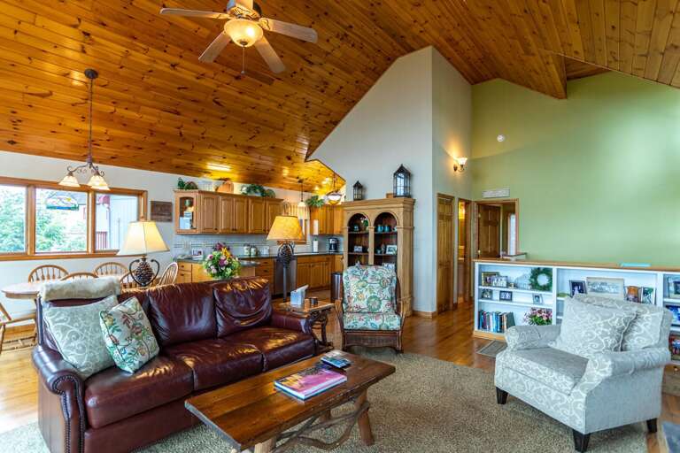 Interior Living Space With Furniture And Wooden Ceiling Interior Living Space With Furniture And Wooden Ceiling