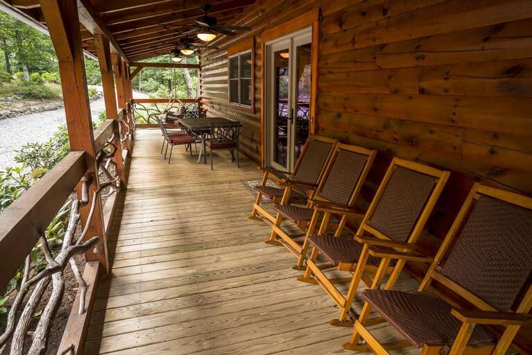Front porch with seating, table and chairs