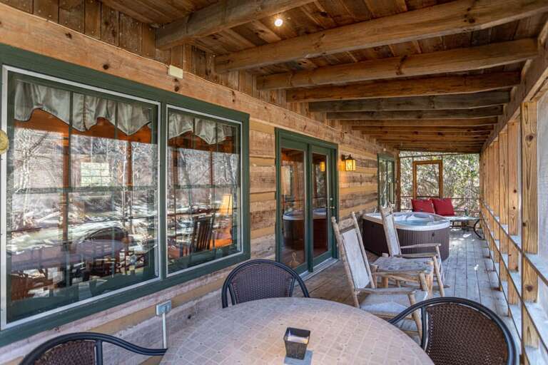 Screened porch with hot tub