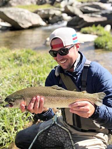 Trophy Rainbow trout caught by guest on the property