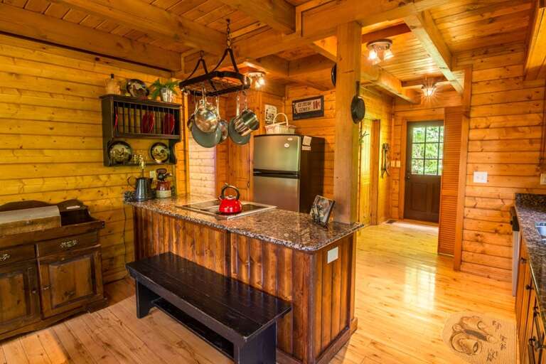 Fully equipped kitchen with granite counter tops and stainless steel appliances