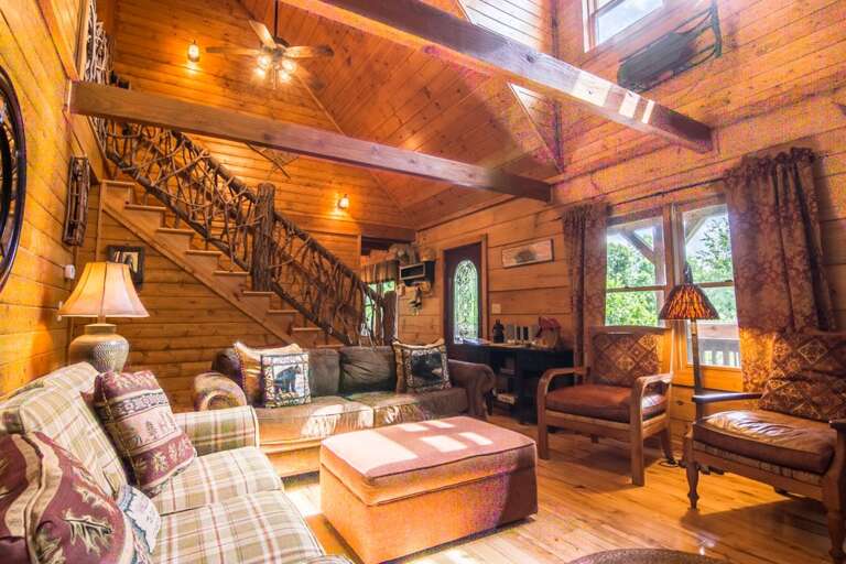 Living room with couches and chairs