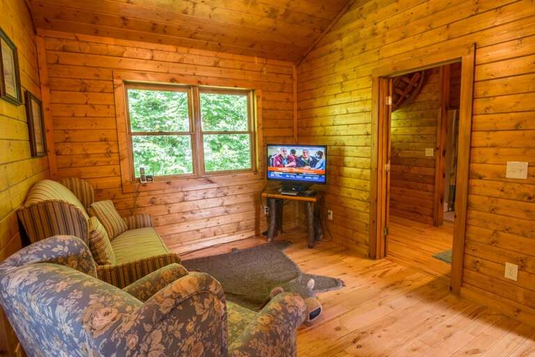 Open loft with sitting area and cable TV and game system