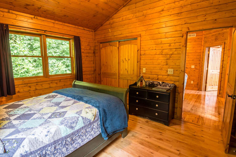 Upper level bedroom with queen bed