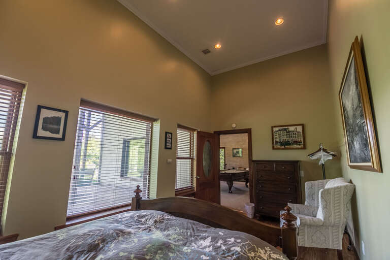 Lower level bedroom with queen bed