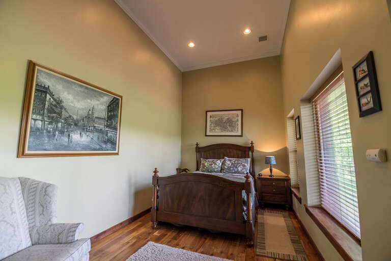 Lower level bedroom with queen bed