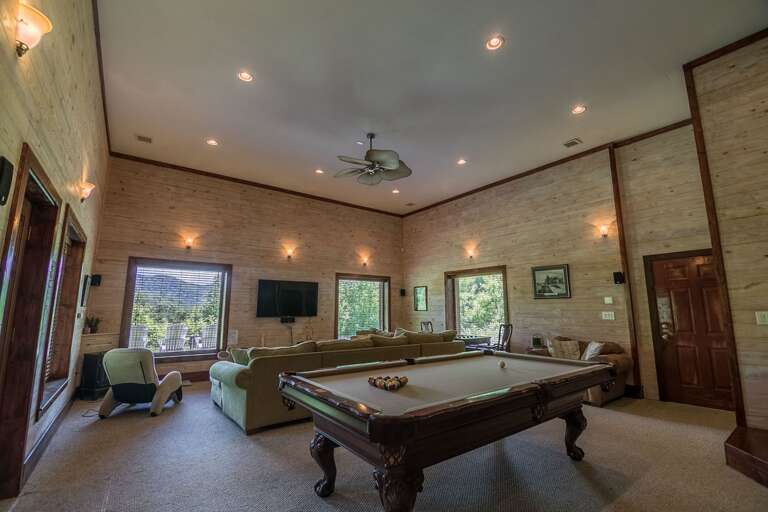 Lower level living area with pool table