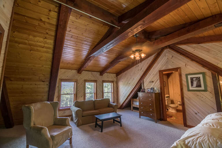 Upper level bedroom with king bed