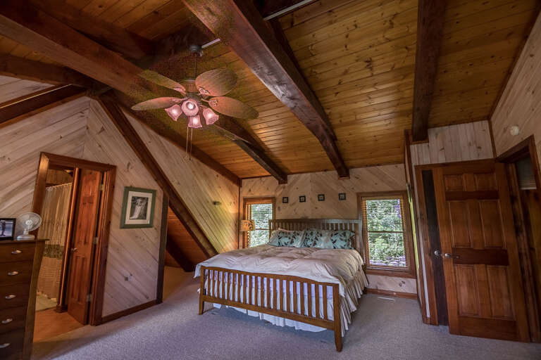 Upper level bedroom with king bed