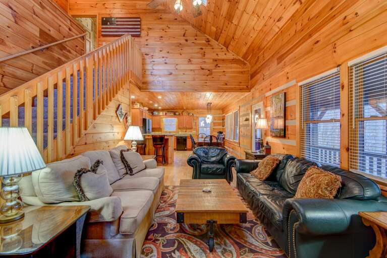 Wooden Interior Living Space With Furniture And Staircase
