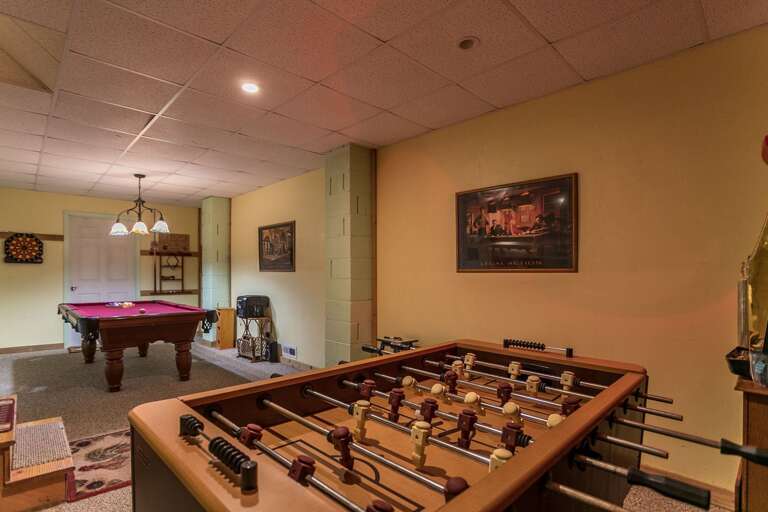 Downstairs game room with Foosball table