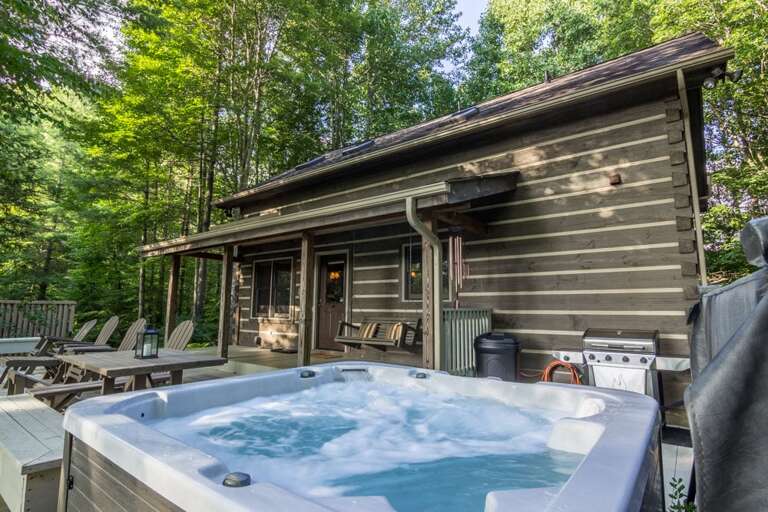 Hot tub on front deck of home