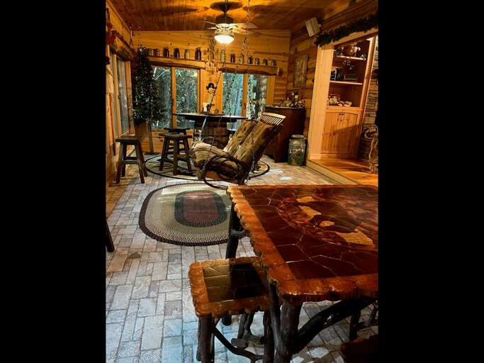 Creek side back porch and dining area. Creek side back porch and dining area.
