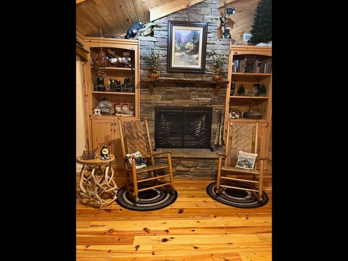 Cozy stacked stone fireplace with gas logs Cozy stacked stone fireplace with gas logs