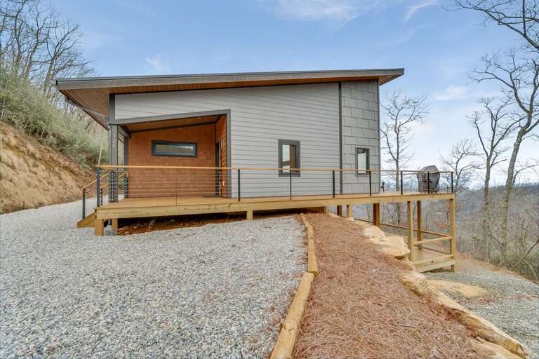 perched on a mountainside open to infinite view