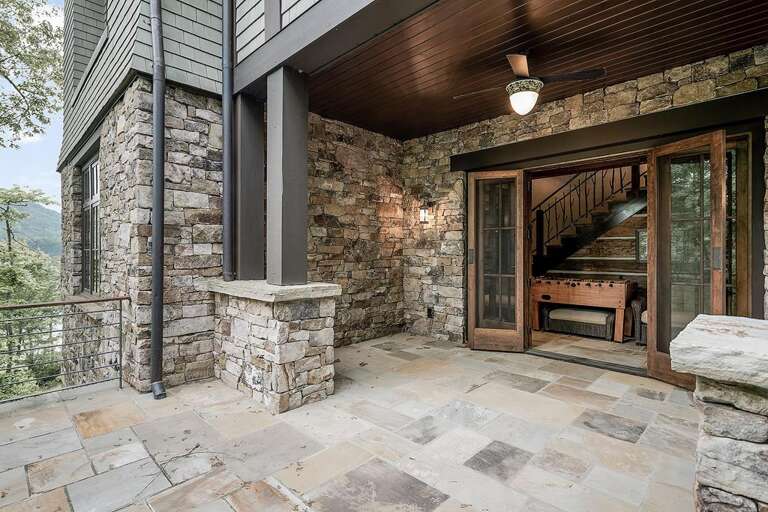 lower level side porch and game room lower level side porch and game room